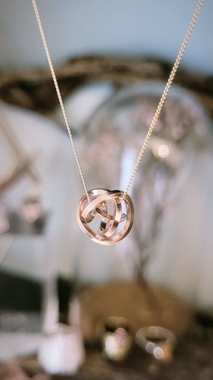 The Gold Knot Pendant You Buy Once and Wear for Decades